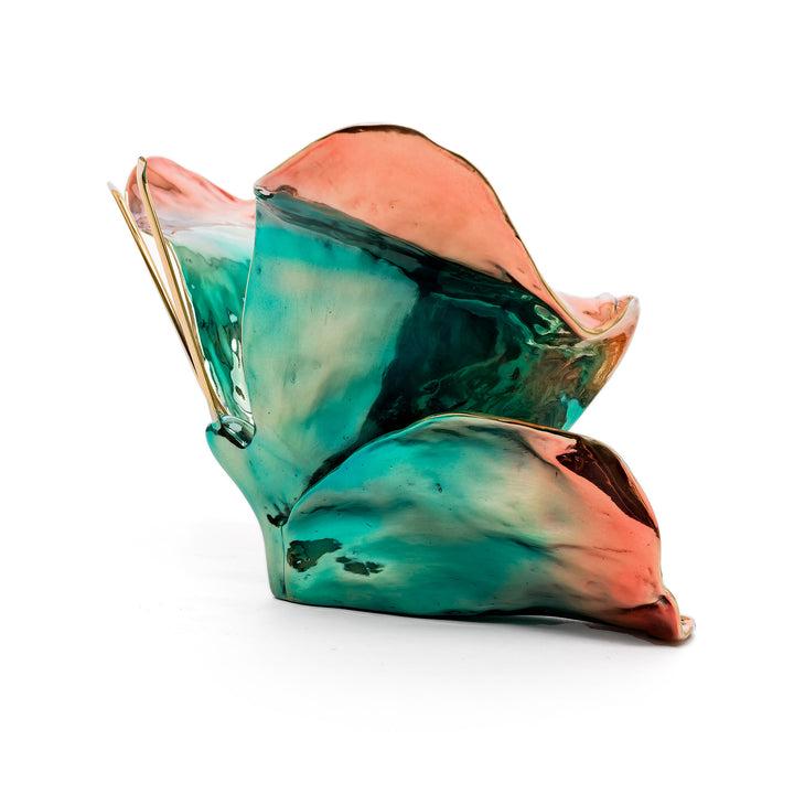 Glossy bronze butterfly with vibrant patina and golden edges