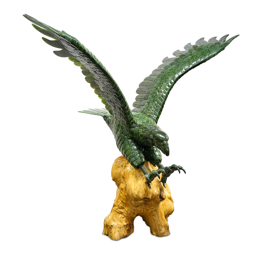 Hand-carved jade eagle sculpture with intricate details