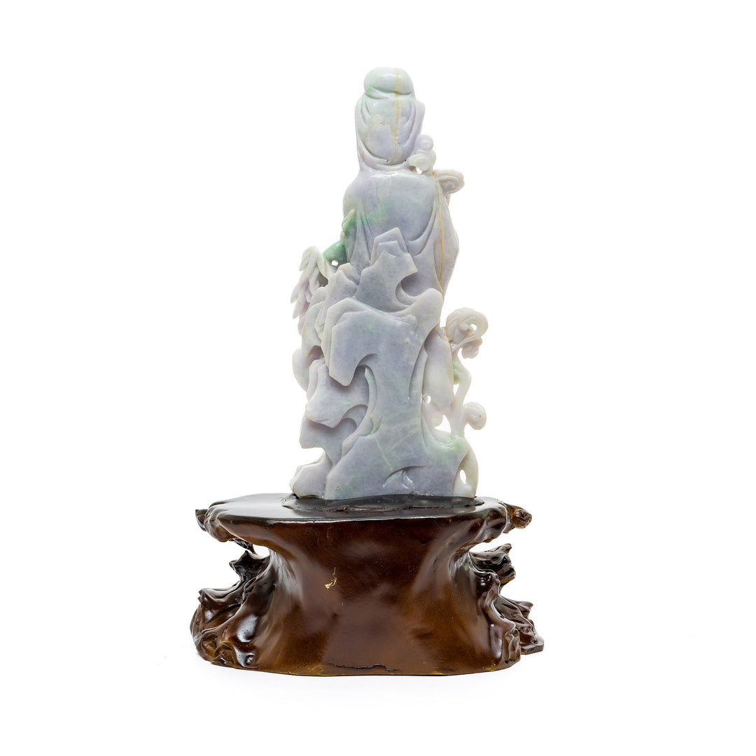Hand-carved jade Guanyin with green accents