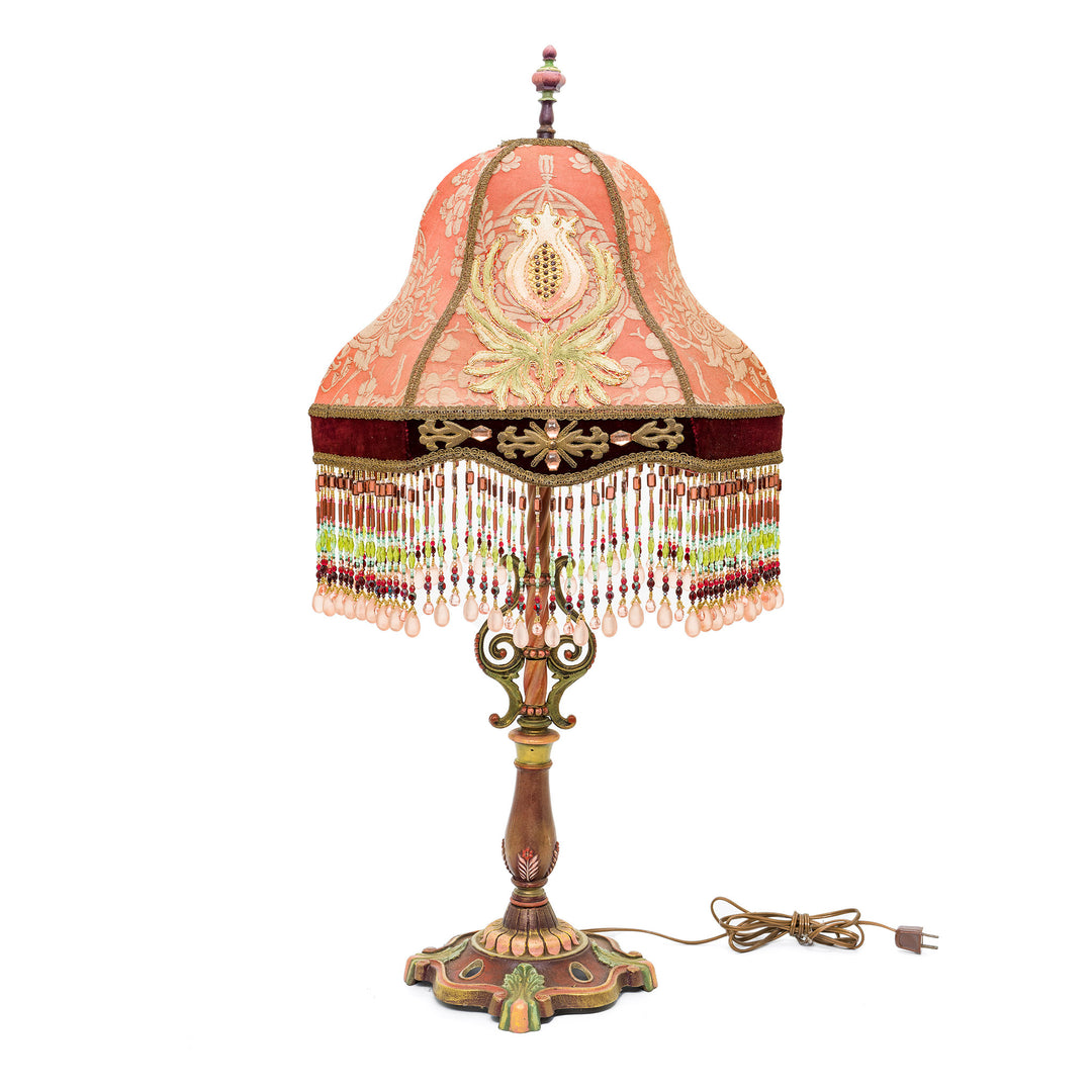 Hand-embroidered bronze lamp with antique materials