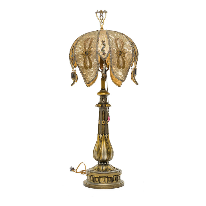 Hand-embroidered bronze lamp with antique materials