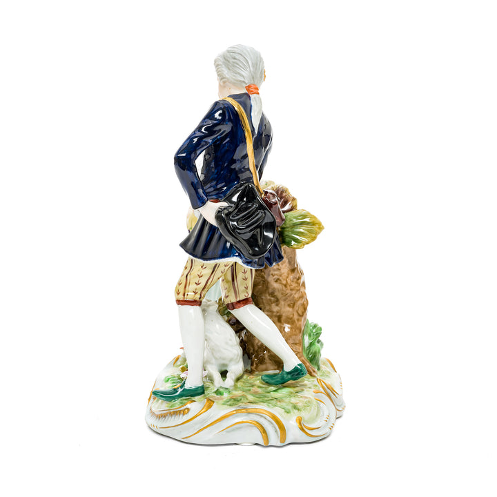 Hand-painted porcelain figurine of a romantic couple in a peaceful pastoral setting, crafted from fine German porcelain.