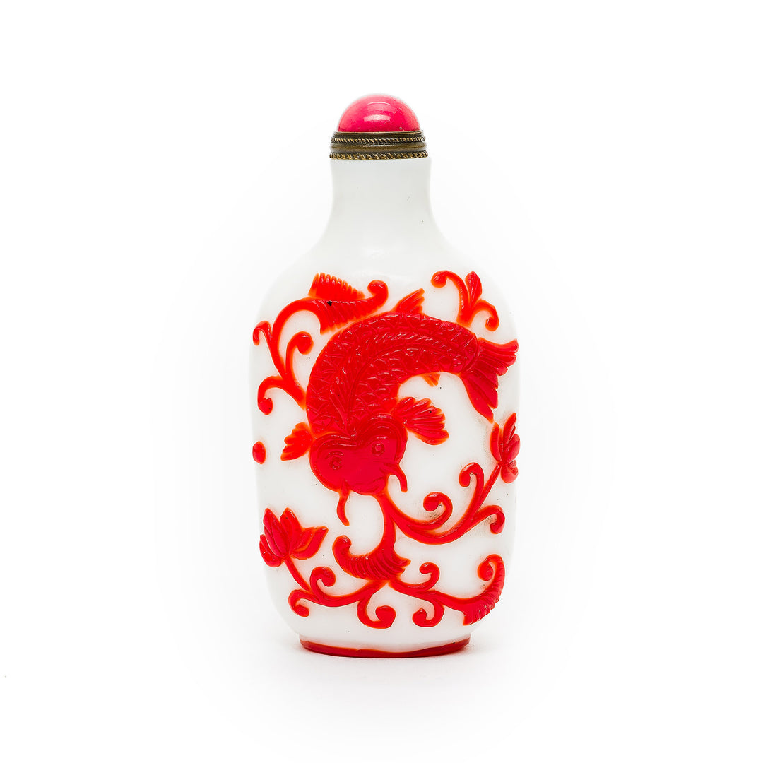 Handcrafted Peking glass snuff bottle with koi fish motif