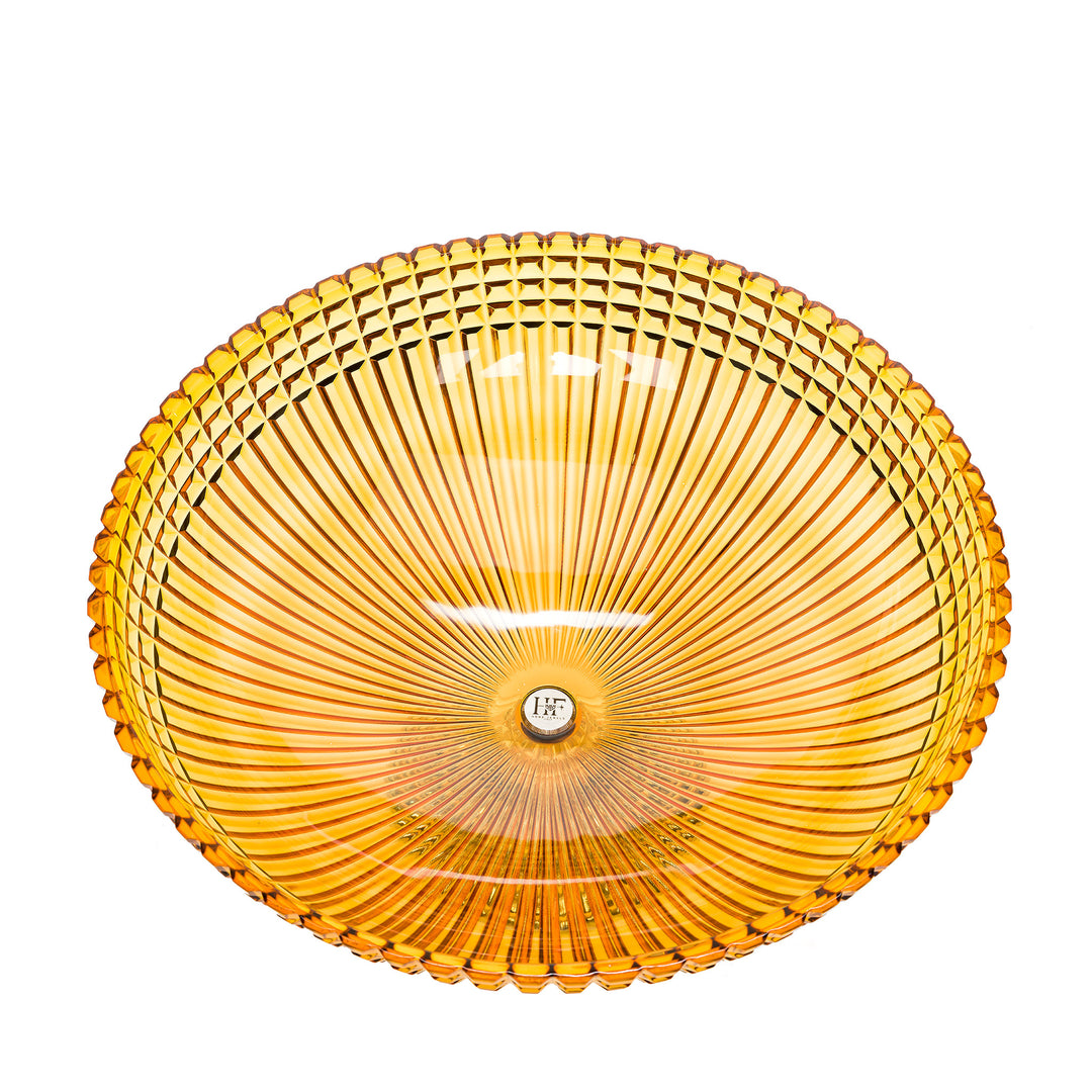 Imported Bacino large amber crystal bowl, showcasing fine Italian craftsmanship with radiant design elements.