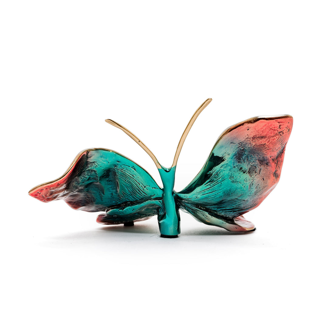 Indigo and coral butterfly artwork in solid bronze