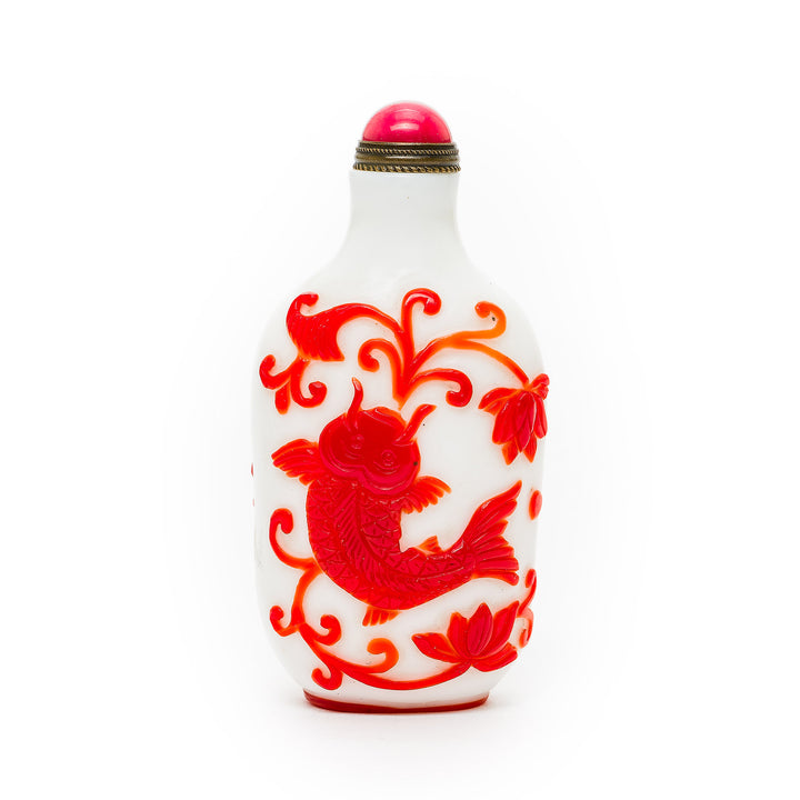 Intricate koi fish design on Peking glass bottle