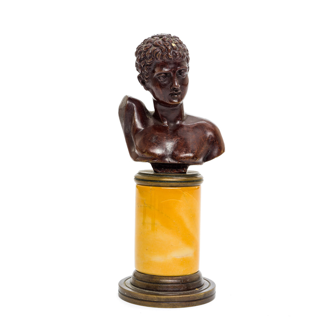 Italian bronze bust on amber marble base, showcasing a classical young male figure.