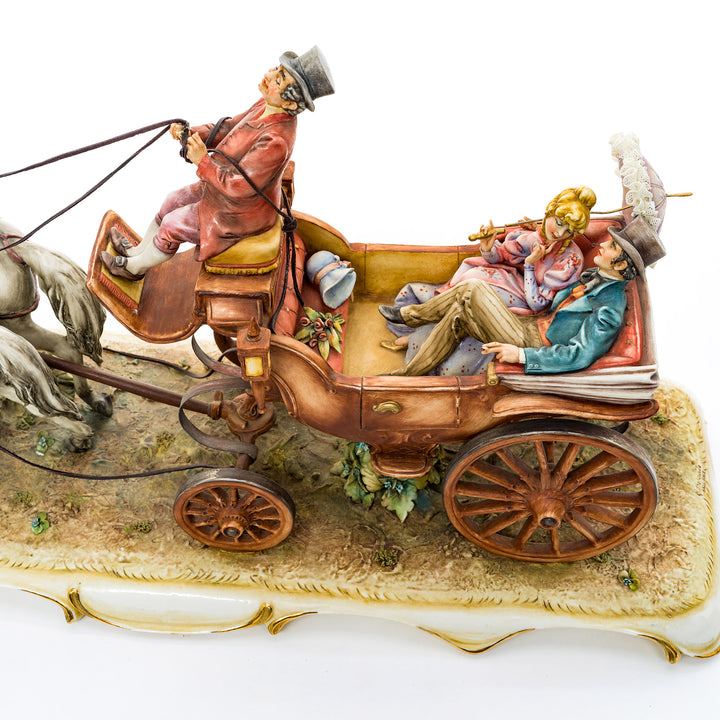 Italian Capodimonte porcelain carriage with white horse and coachman.