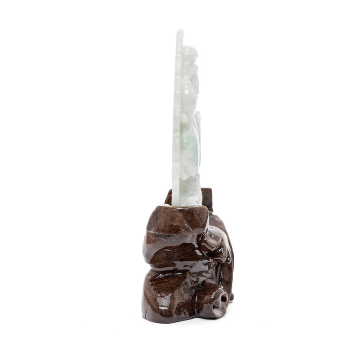 Hand-carved jade goddess figure with floral element