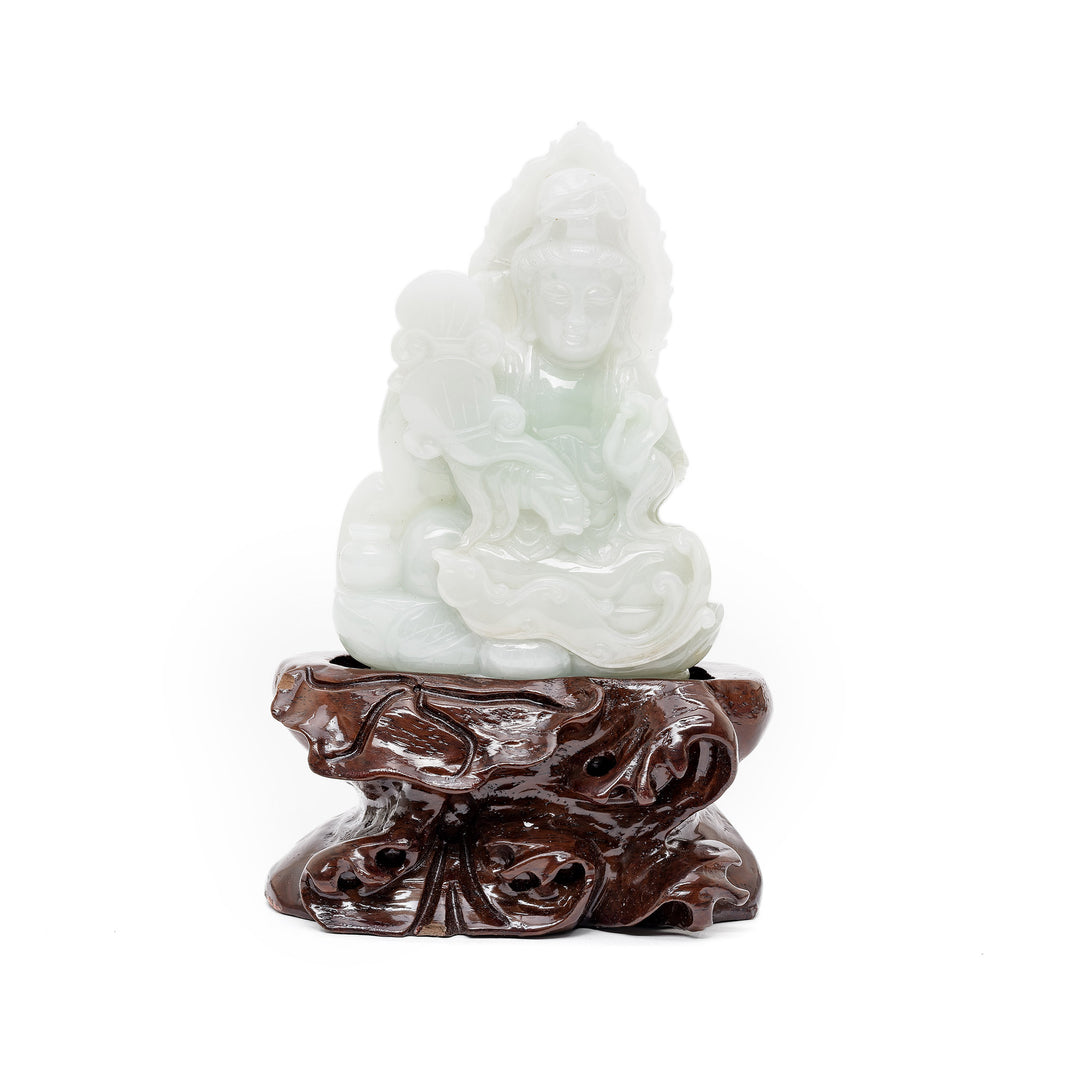Jade Guan Yin sculpture with mini urn on wood base