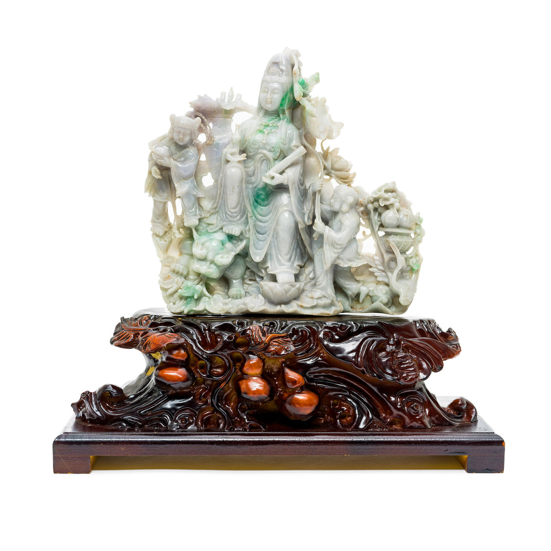 Jade Quan Yin sculpture with children and floral motifs