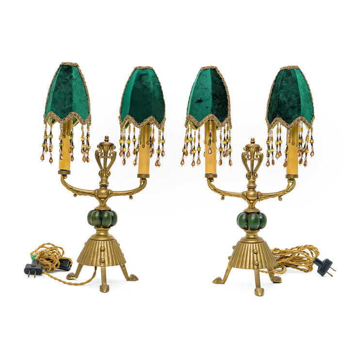 Pair of luxurious antique lamps with green glass accents and velvet shades