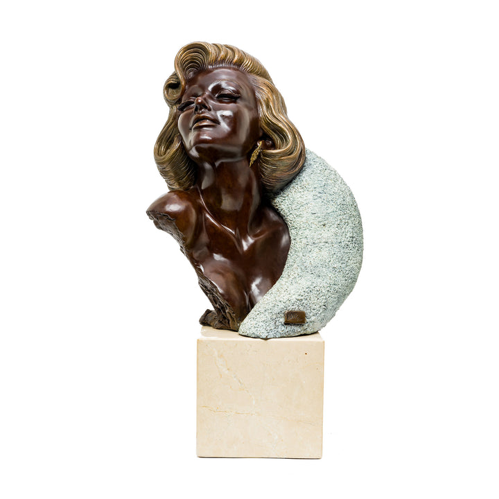 Front view of Marilyn Monroe bronze bust with serene expression
