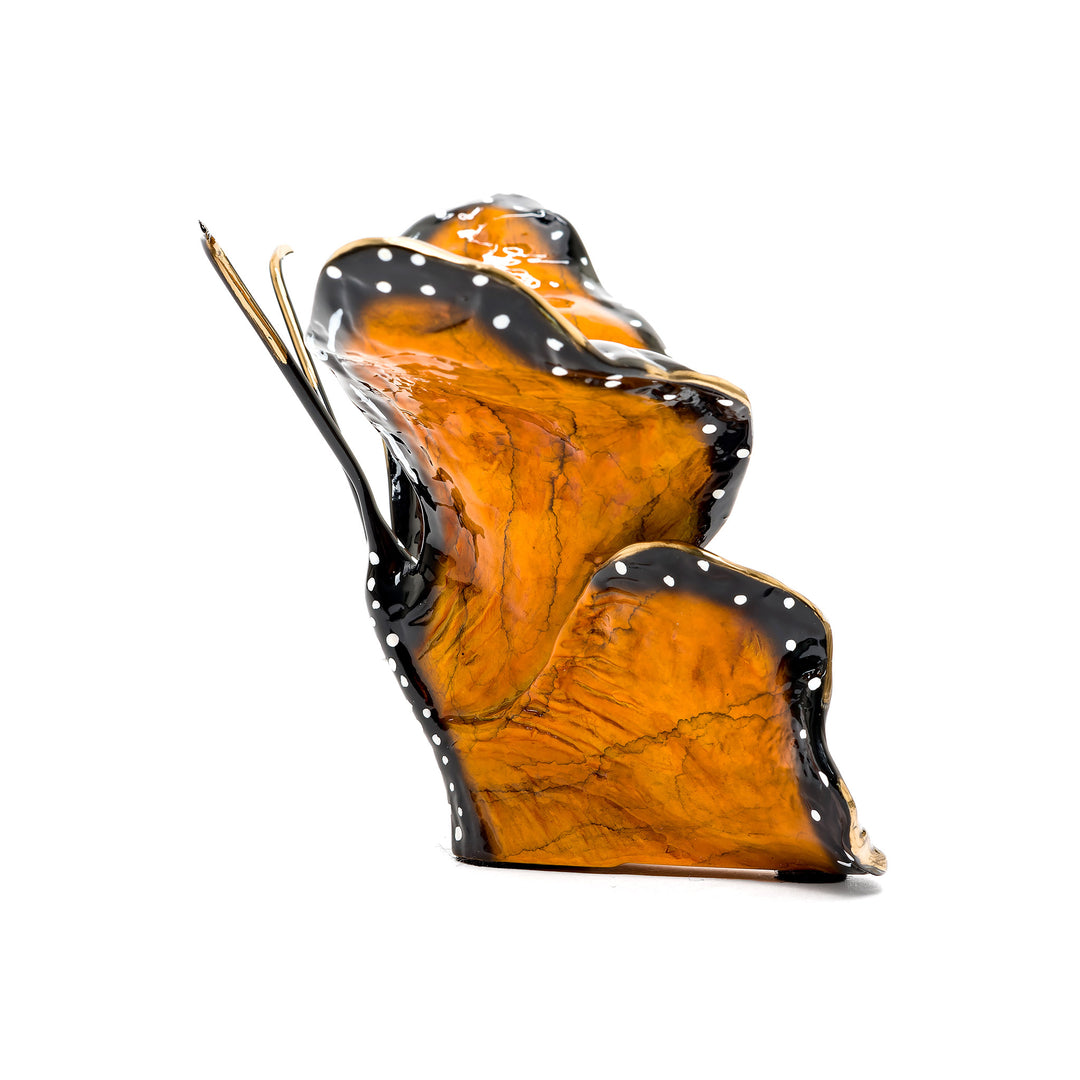 Monarch-inspired butterfly sculpture with glossy enamel finish