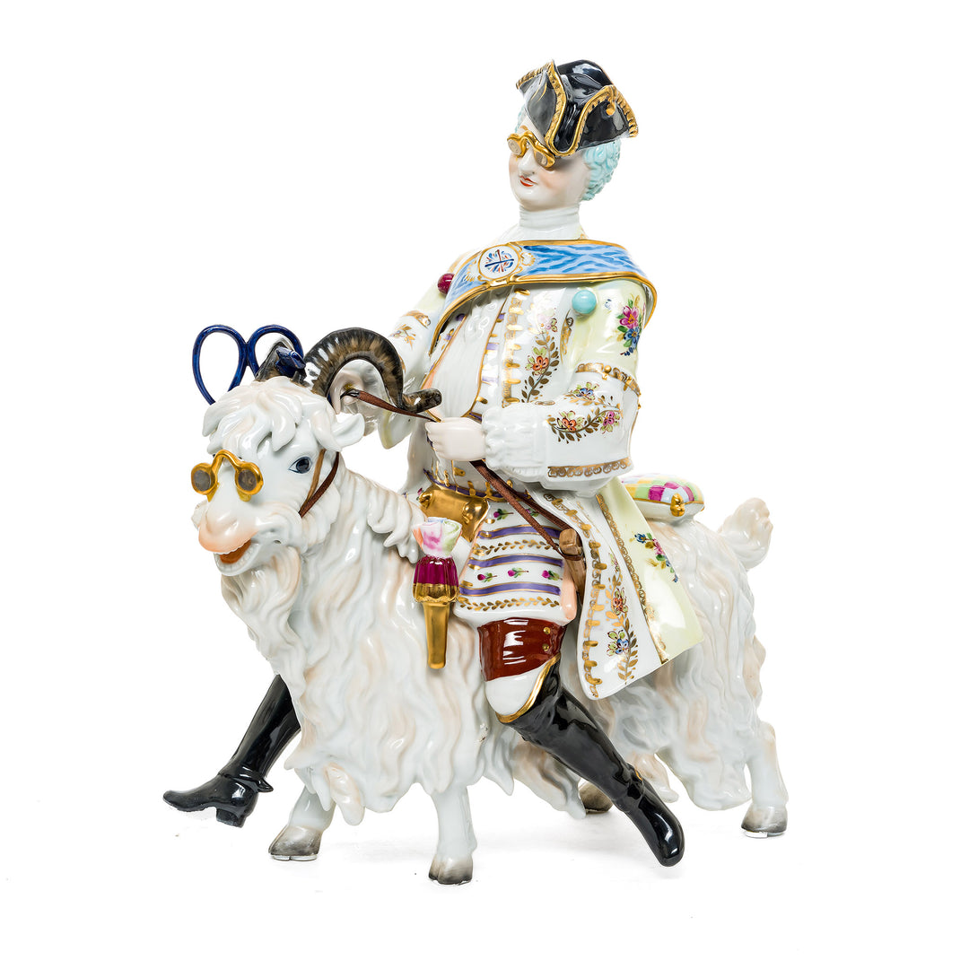 Nobleman on a Goat German porcelain figurine, featuring a whimsical and playful design.