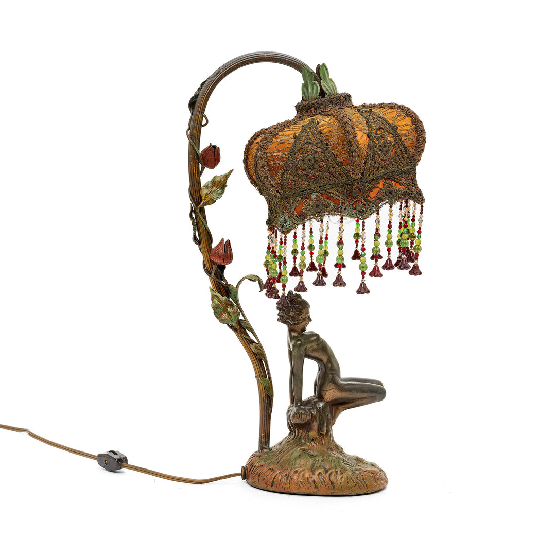 Ornate Art Nouveau lamp with intricate embroidery