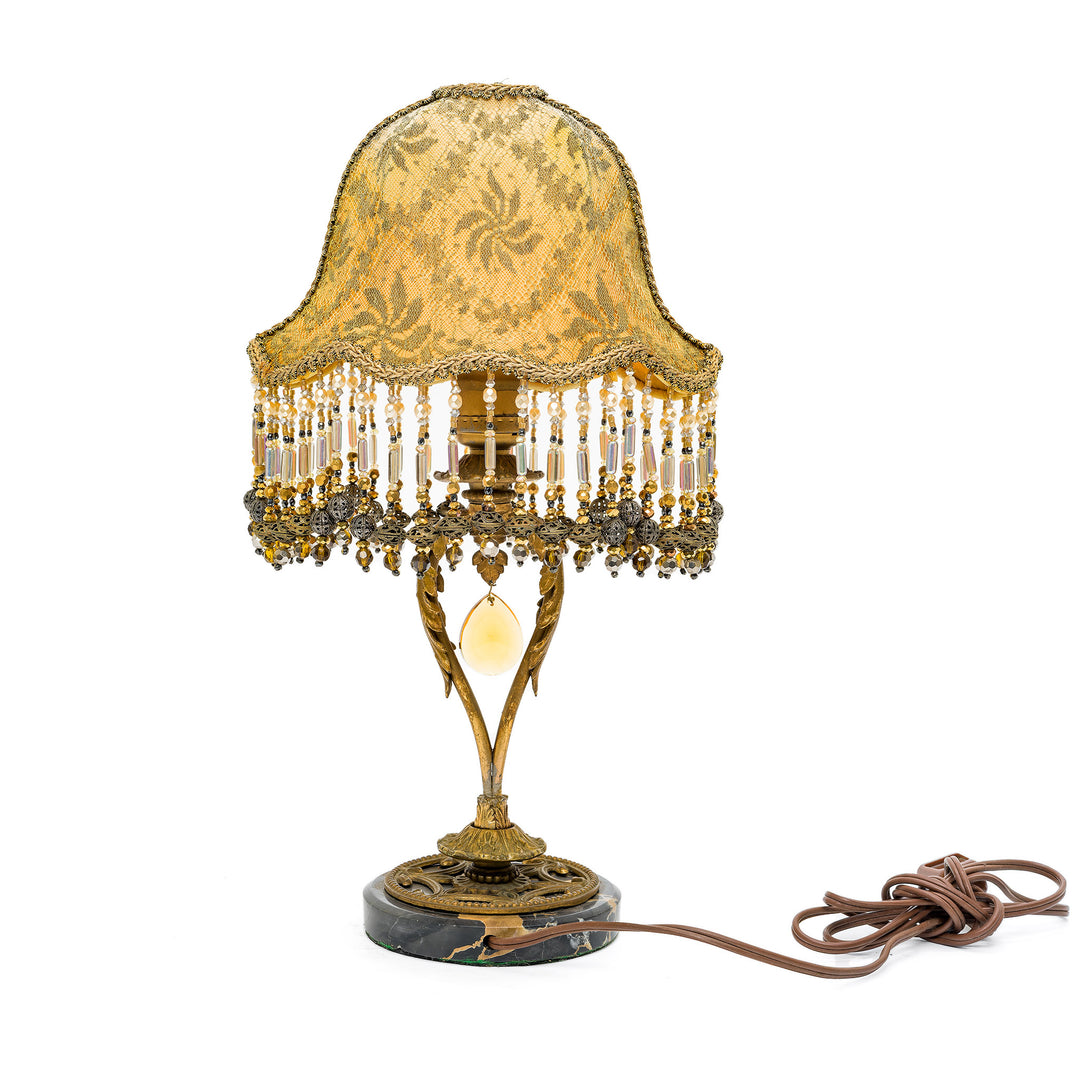 Ornate embroidered lamp with cascading beadwork