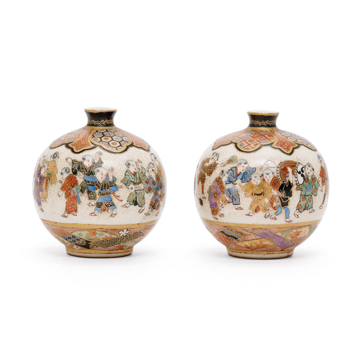 Pair of small Satsuma vases with hand-painted festive scenes