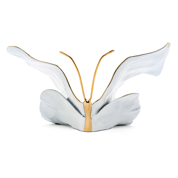 Rear angle showing sculptural wing contours in pearl finish