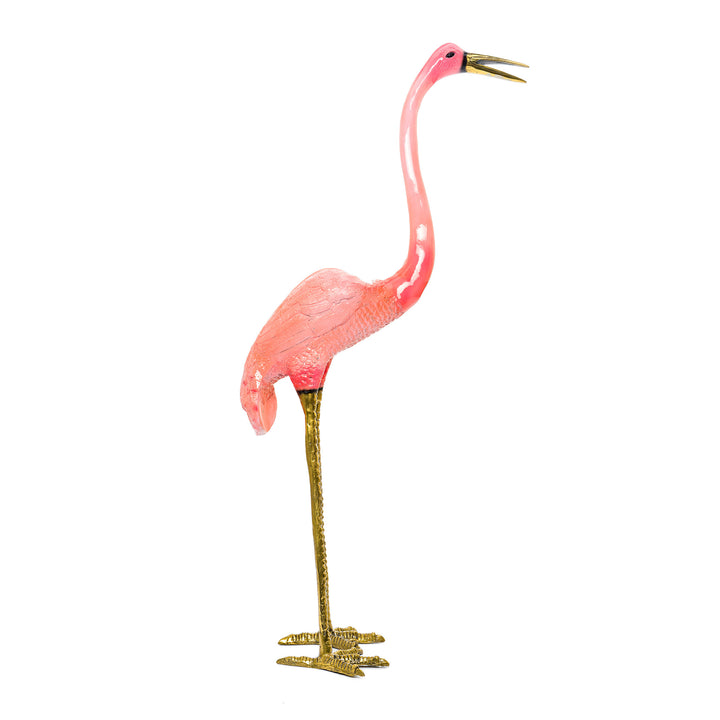 Pink flamingo statue with golden legs and smooth textured body.