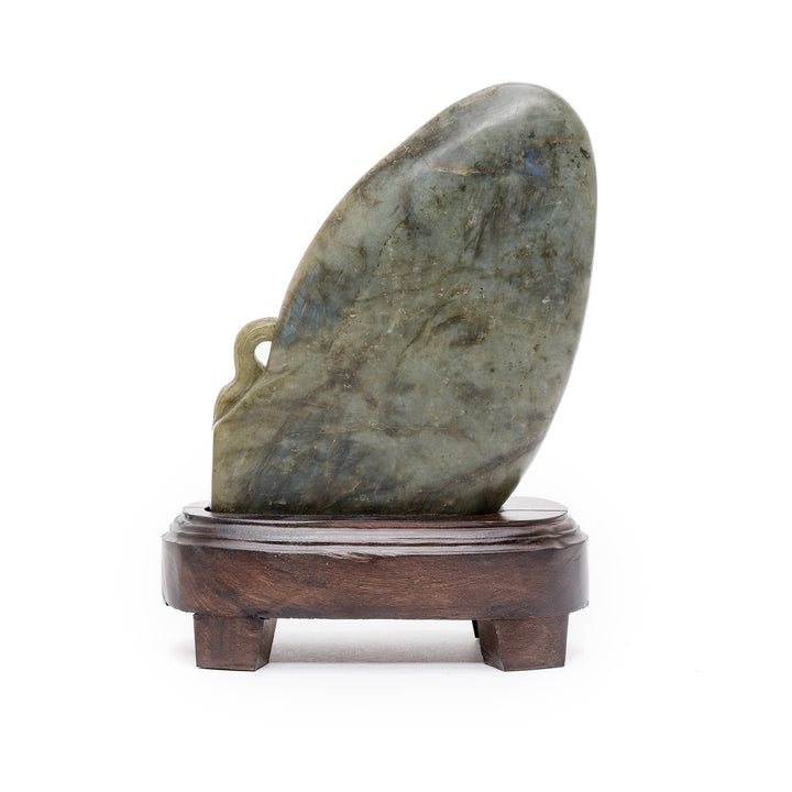 Rear view of boulder-backed labradorite sculpture