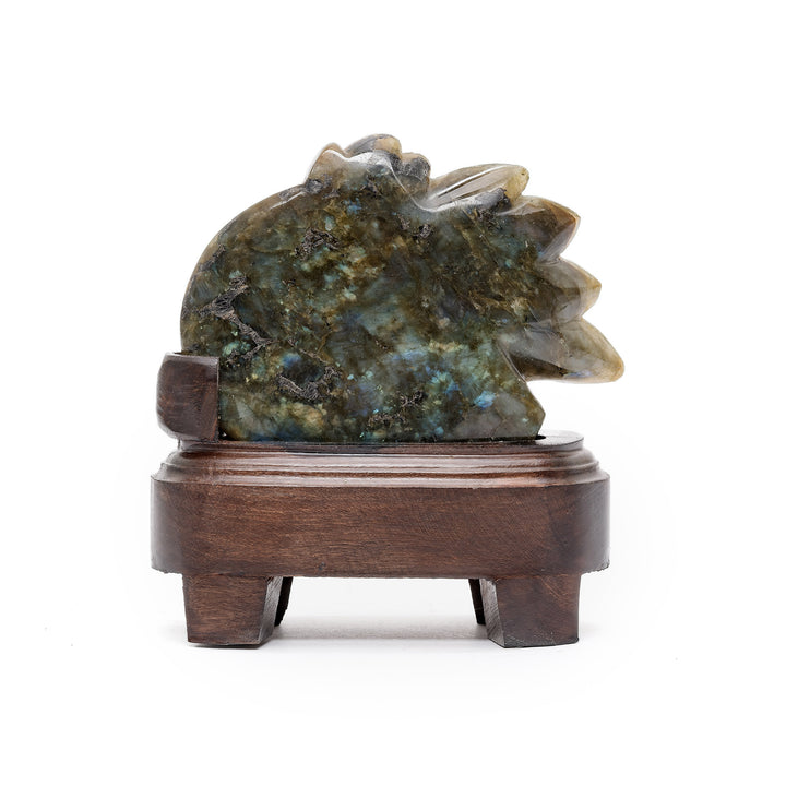 Rear of gemstone carving with feather details