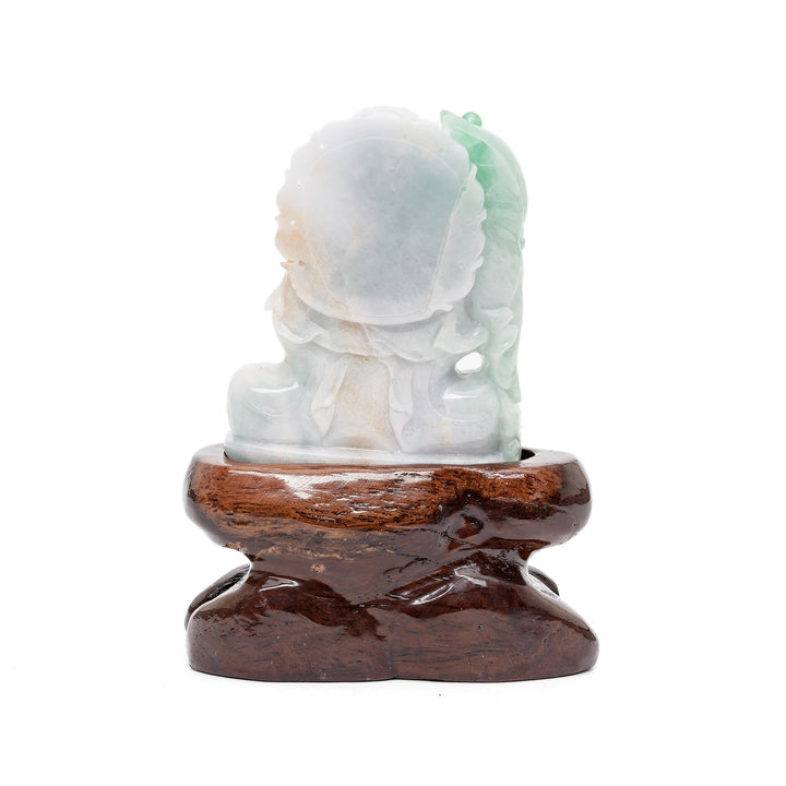 Rear view of multicolor jade Guan Yin carving