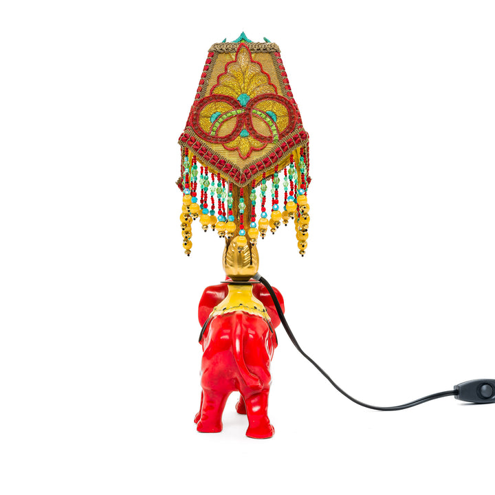 Red ceramic elephant lamp with gold accents