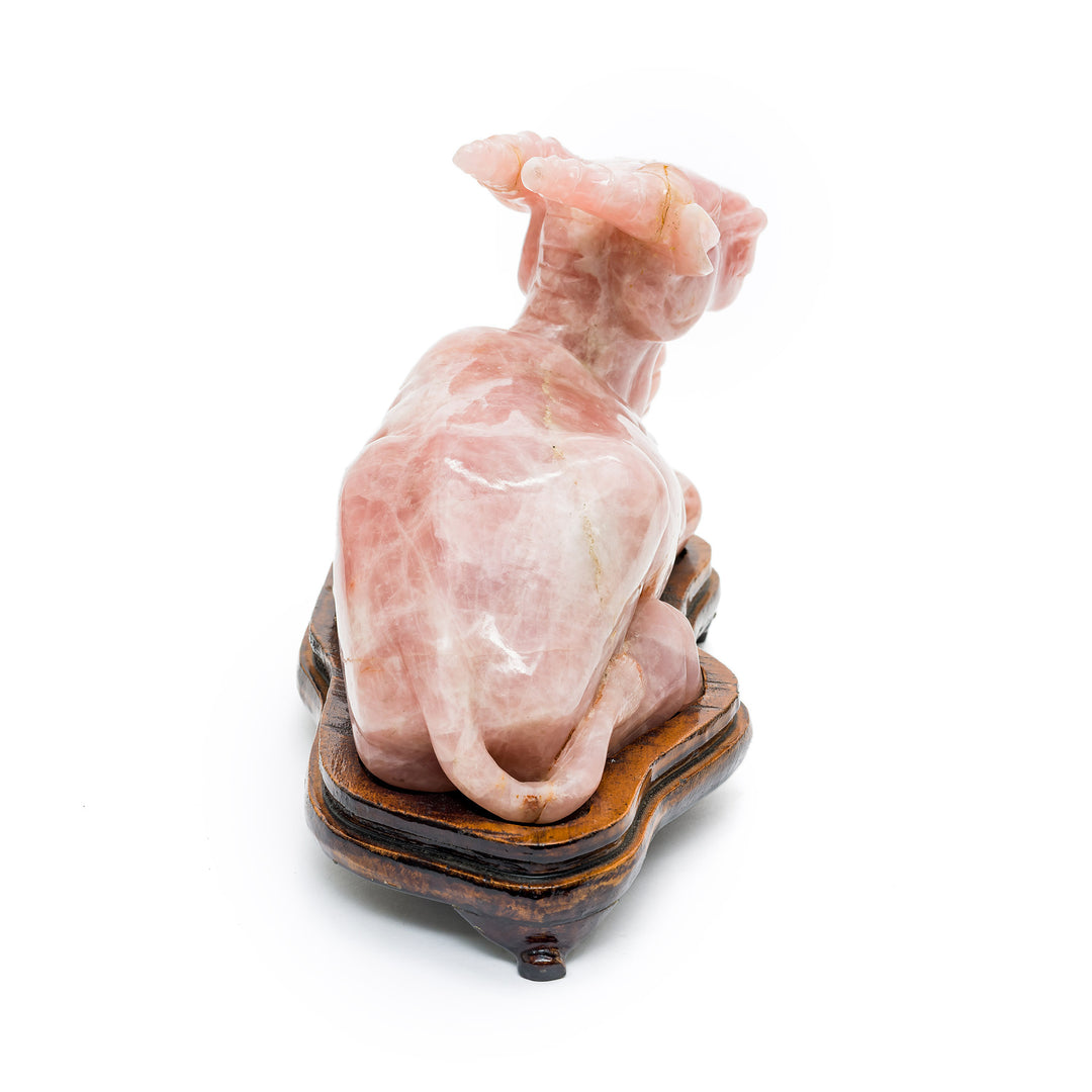 Rose quartz animal carving on antique-style base