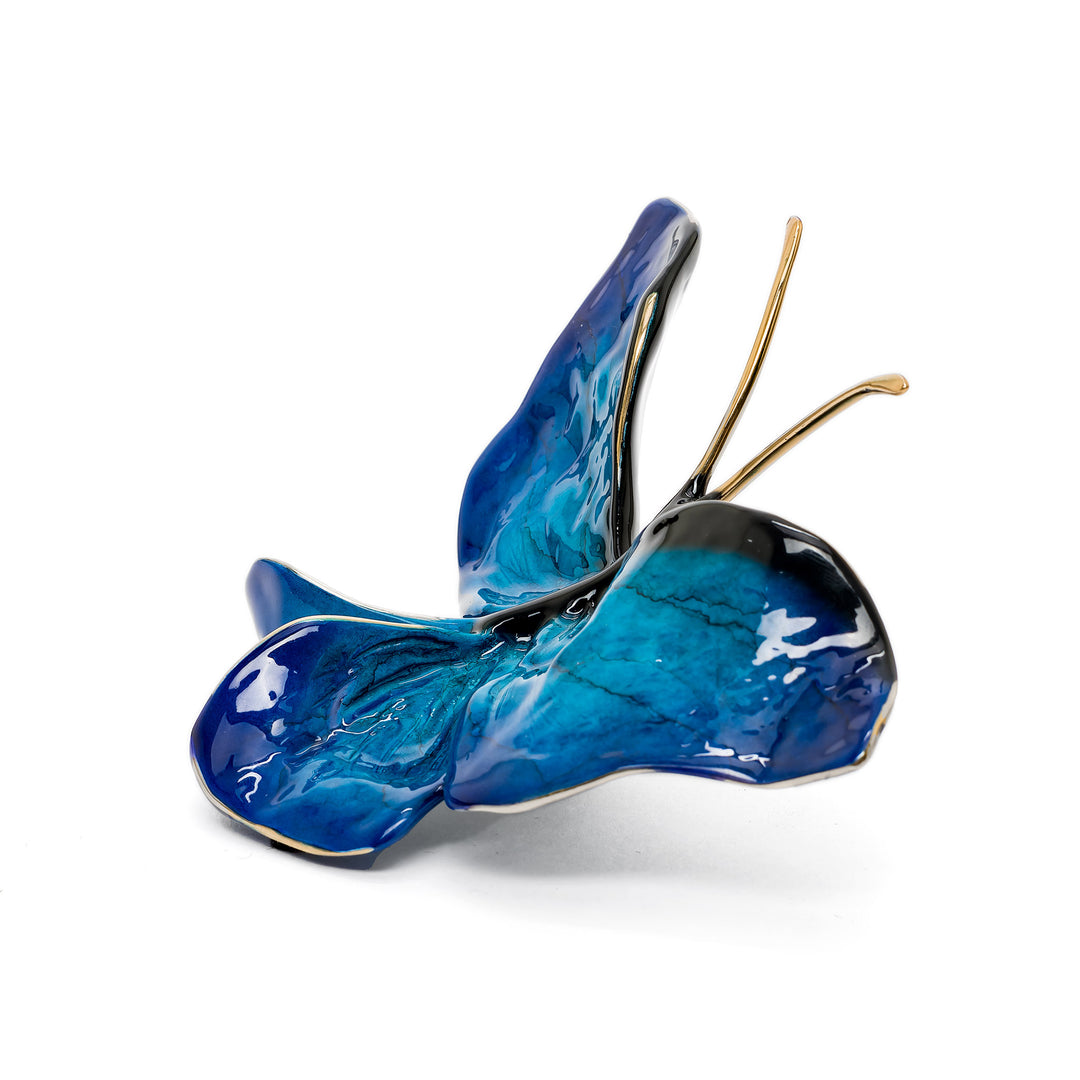 Side view of Ruiz butterfly with deep blue enamel finish