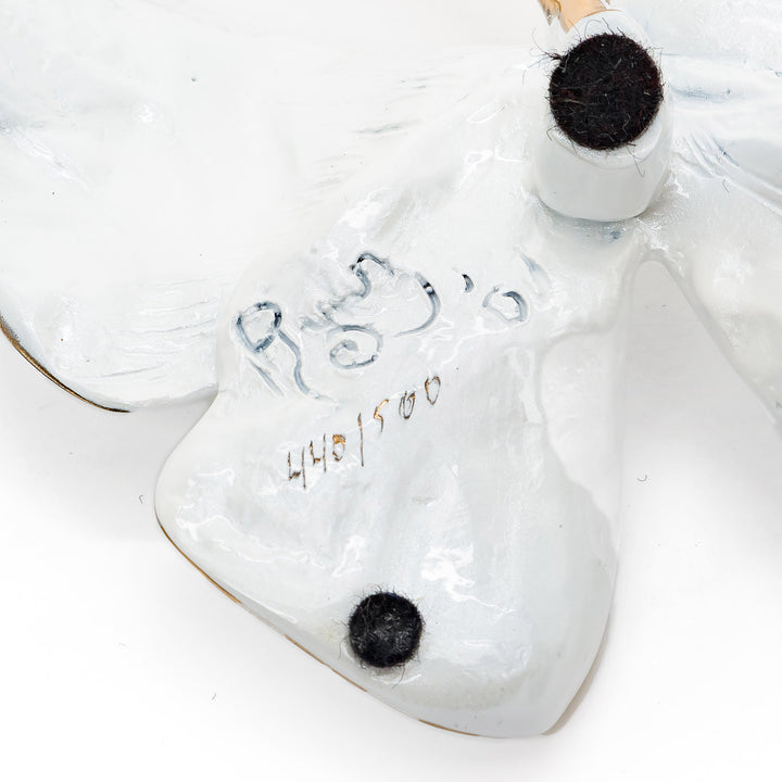 Signature and edition number on butterfly base