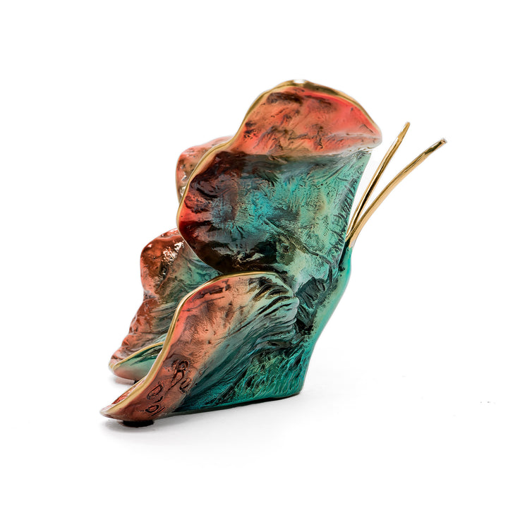 Side view of Ruiz butterfly with verdigris and copper tones