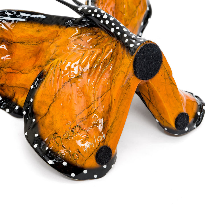 Ruiz signature and edition number beneath bronze butterfly