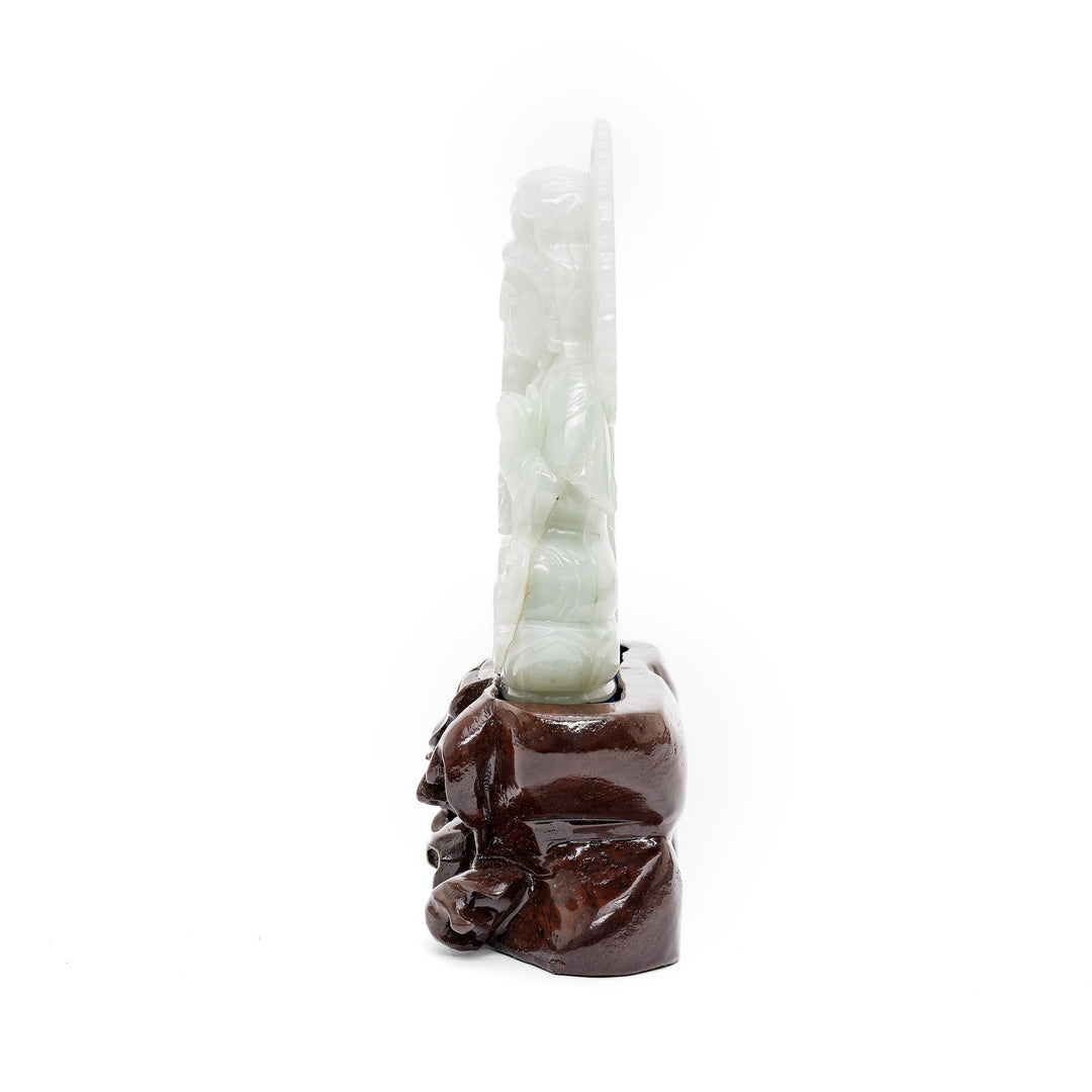 Side view of jade Bodhisattva holding urn