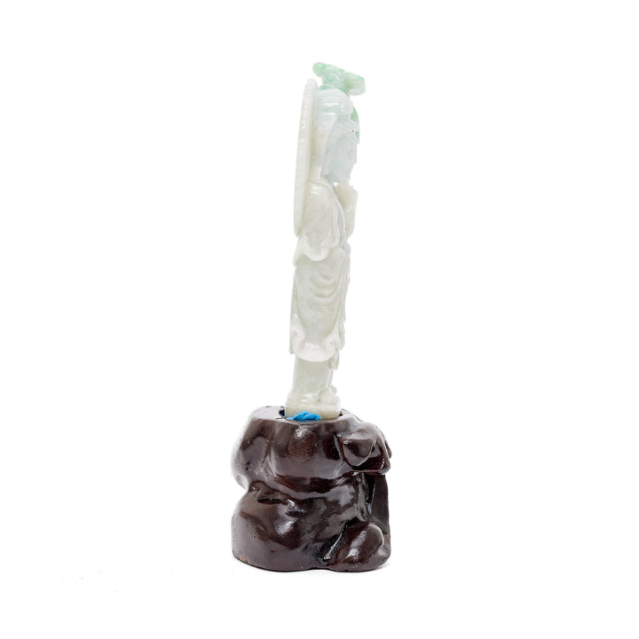 Side view of jade Guan Yin with floral carving