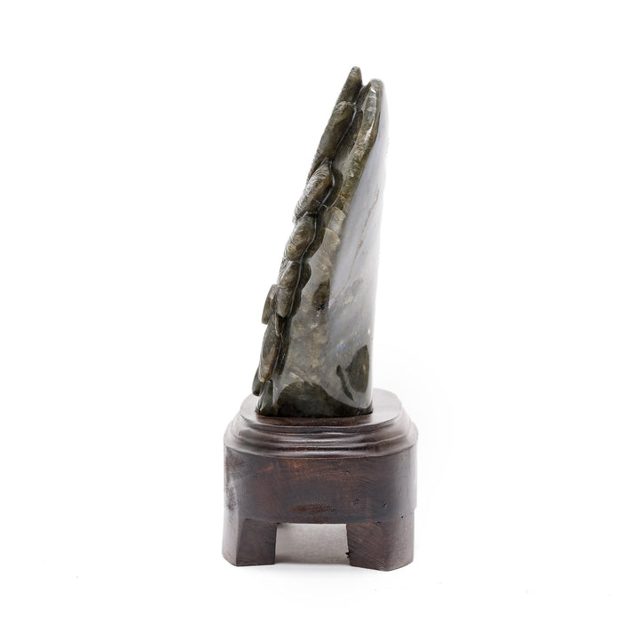 Side view of labradorite warrior sculpture