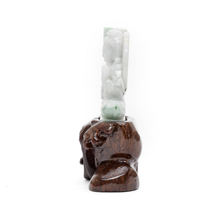 Side view of miniature jade Guan Yin statue