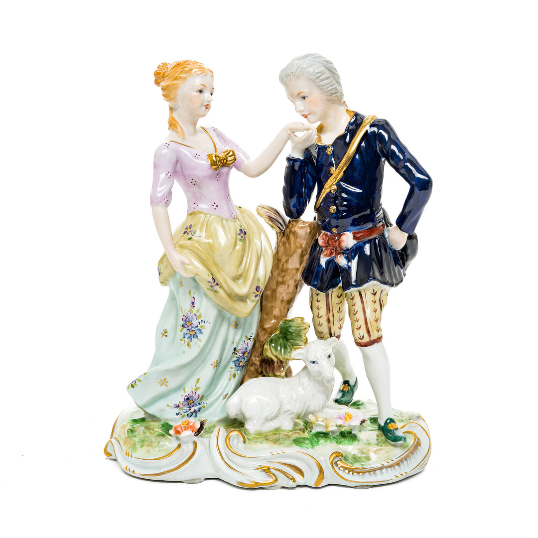 Tender Moments of Romance German porcelain figurine featuring a romantic couple and a resting lamb.