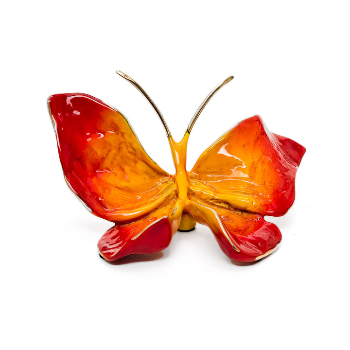 Vibrant flame patina bronze butterfly sculpture in fiery red and amber