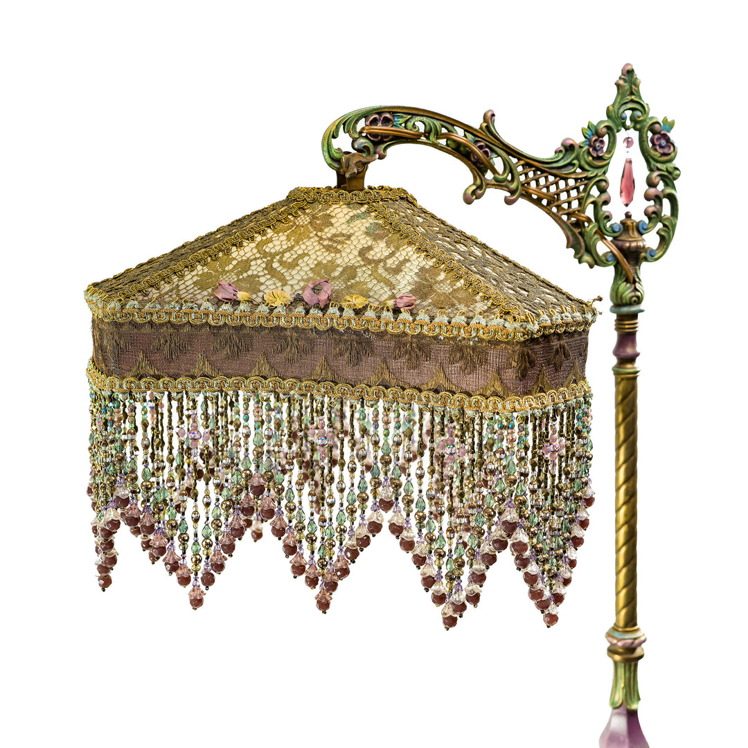 Victorian-style floor lamp with ornate embroidered shade and lace overlay