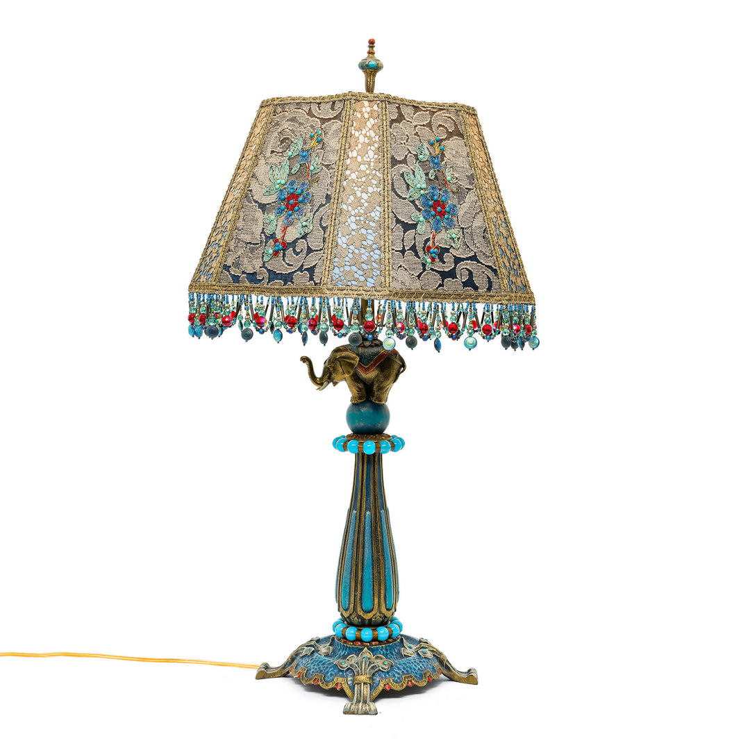 Hand-embroidered bronze lamp with antique materials