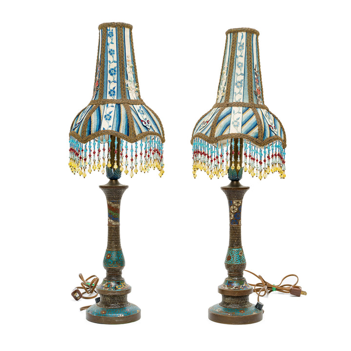 Vintage-inspired bronze lamps with embroidered fabric shades