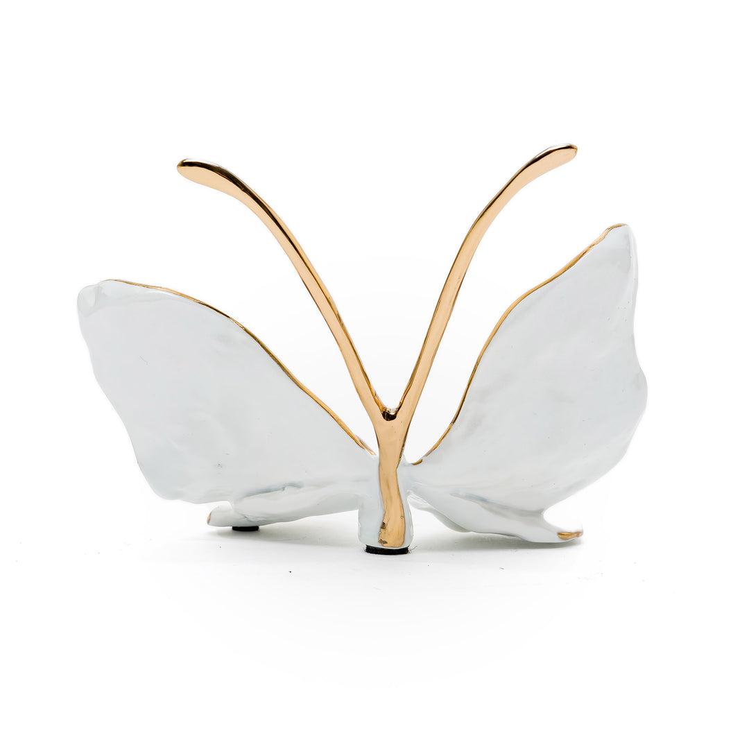Rear view showing golden wings and polished antennae