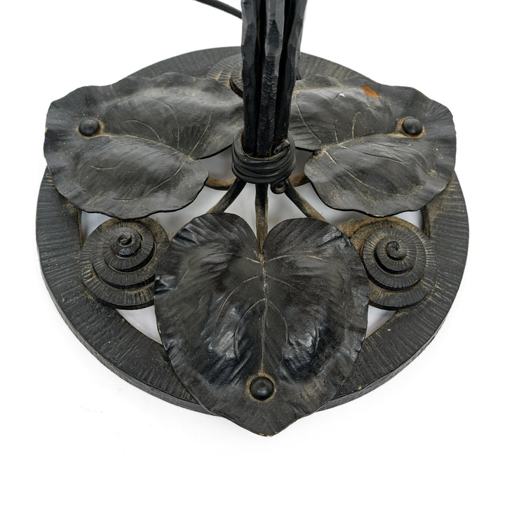 Wrought iron tripod base with leaf motif