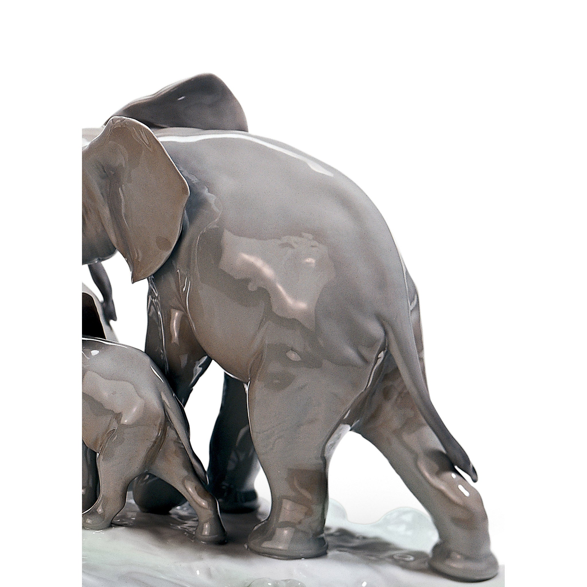 Elephants Walking Figurine