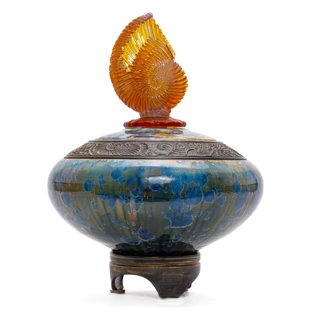 Elegant hand-carved porcelain vessel with sculpted crystal detail