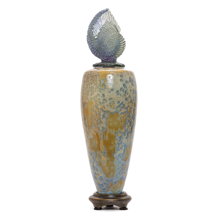 Intricate green porcelain vase with sculpted crystal detail