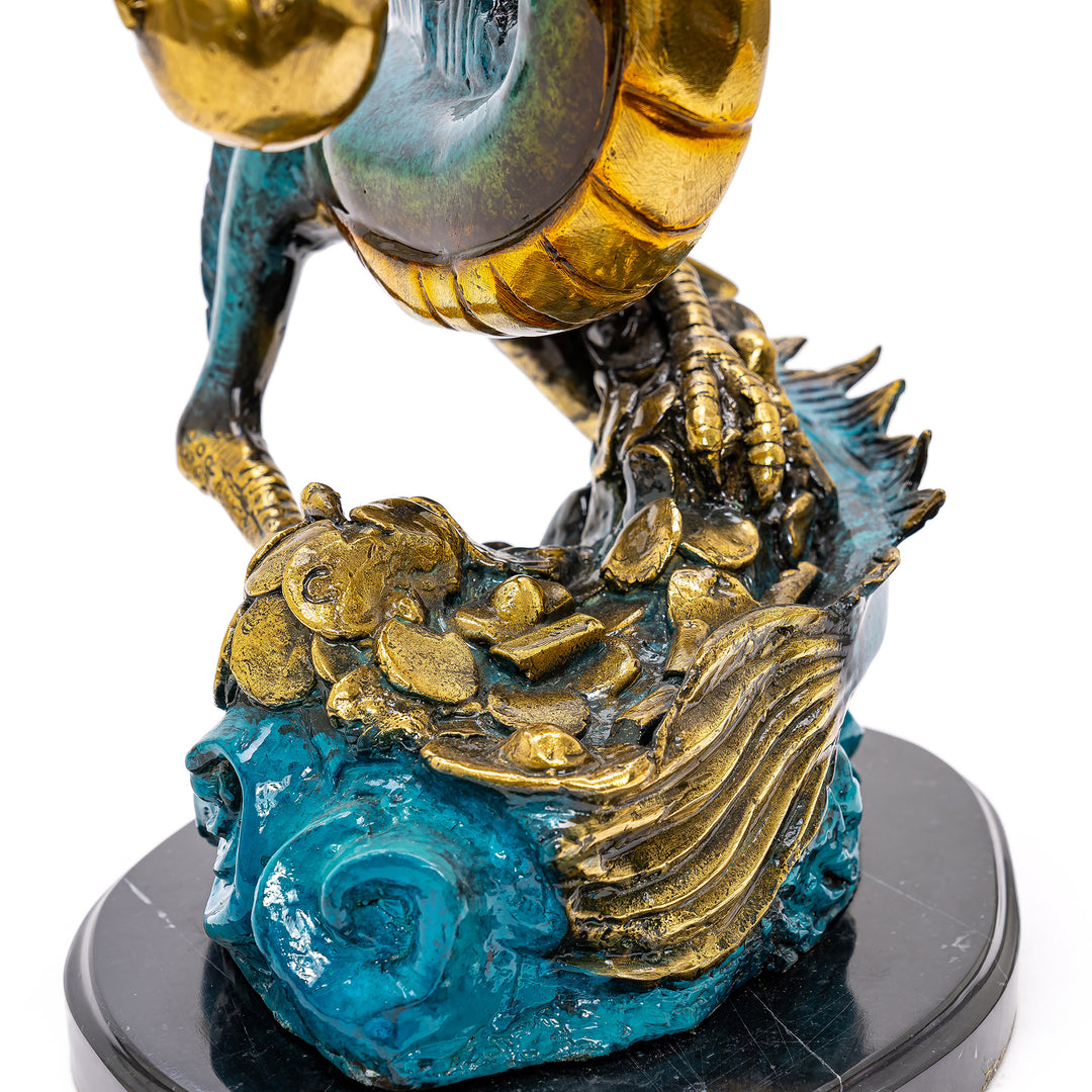 Enigmatic dragon statue with pearl of knowledge