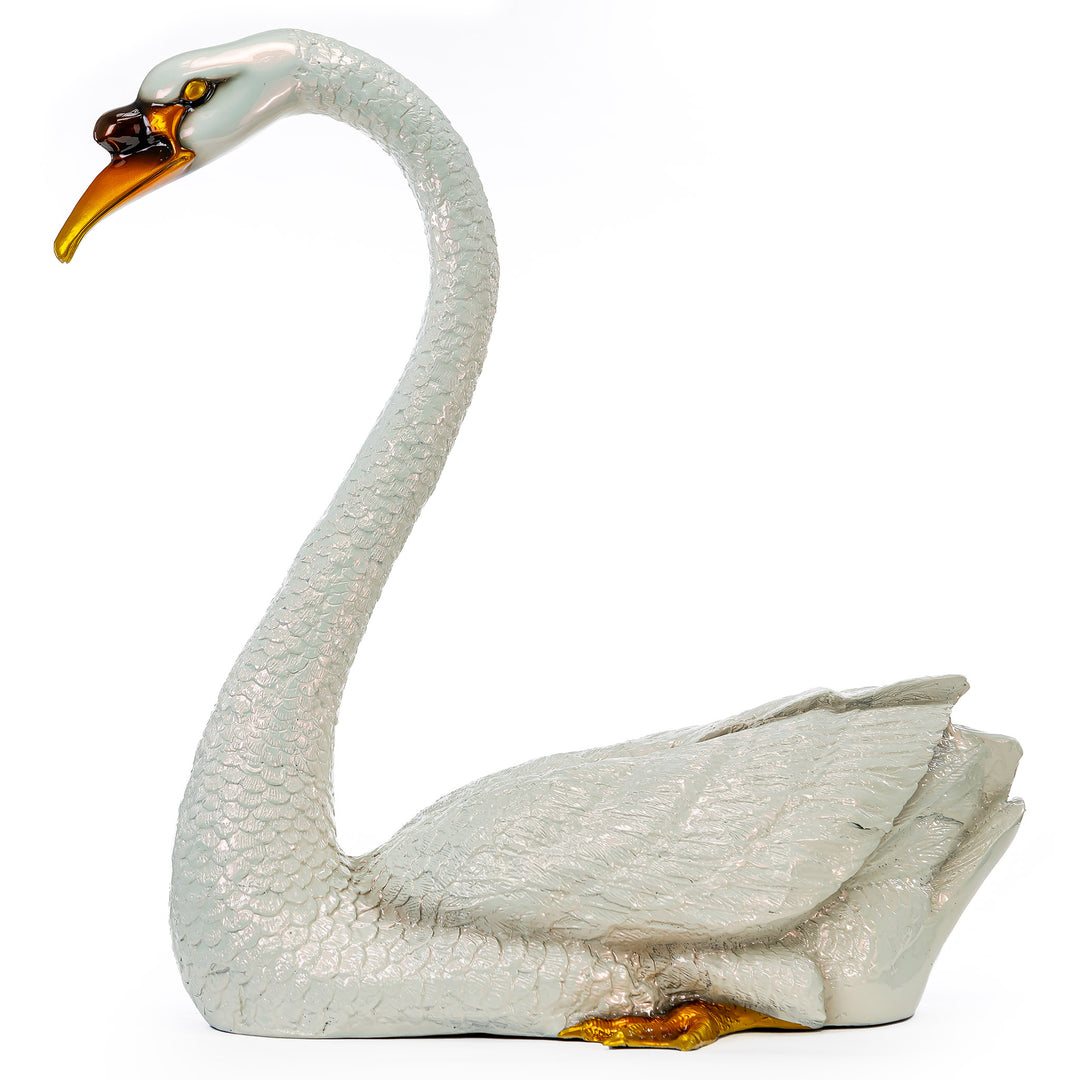 Serene white swan bronze sculpture with luxury car paint