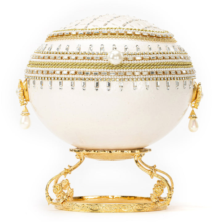 The Egg Fantasy Ostrich w/Mini Egg Music Box part of the  exquisite Egg Fantasy collection is handcrafted in the USA from natural ostrich, emu, goose, duck, and quail eggs. Image #1